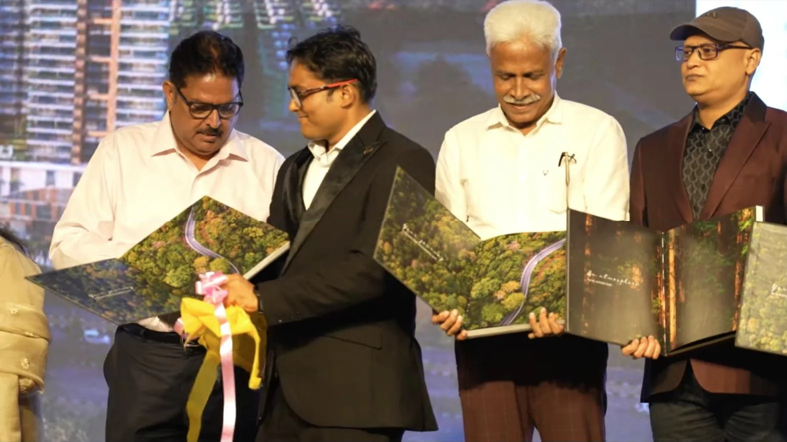 Unveiling the Stalwart Atmosphere brochure on stage